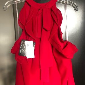 Ruffle back tie sleeveless blouse